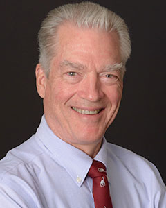Headshot of Dr. Oliver Mullins