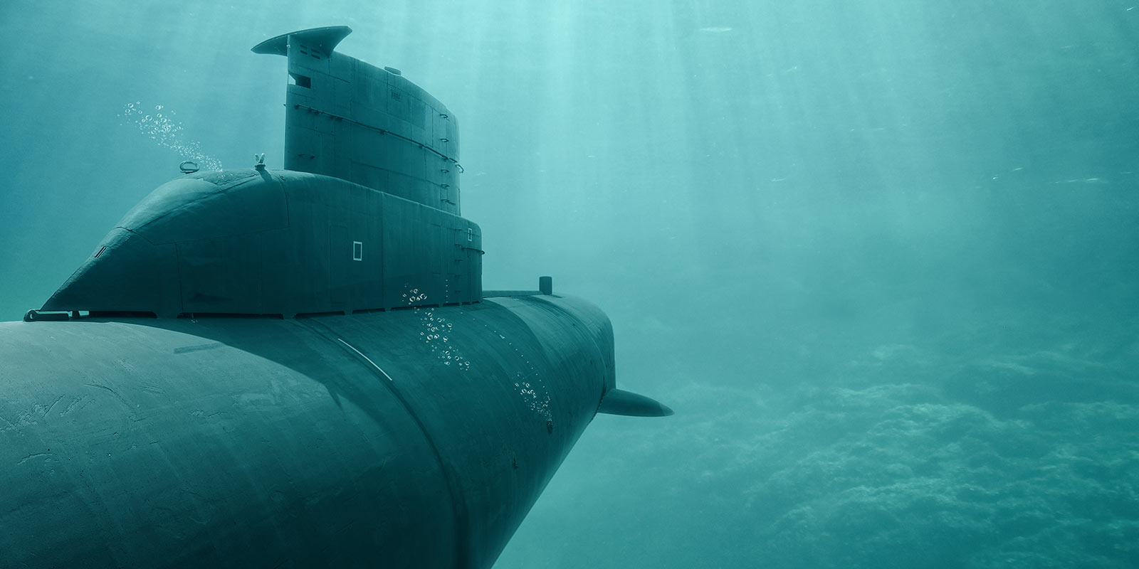 An underwater view of a naval submarine.
